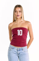 A strapless dark red tube top with a large white number 10 graphic on the chest worn as part of a matching two-piece set.