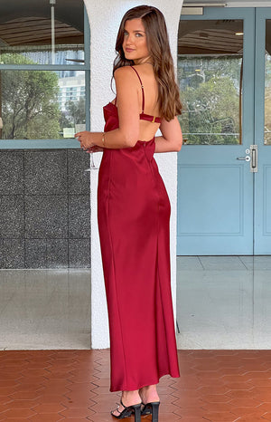 Red maxi dress with lace detailing worn on brunette model