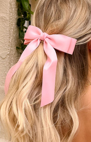 pink oversized hair bow with clip attachment