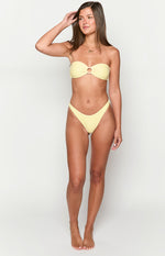 Front view of yellow and white striped high-cut bikini bottoms with a V-front