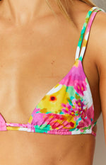 Close-up of the pink, yellow, and green floral print triangle bikini top with ruched elastic trim