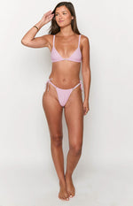 Front view of pink gingham tie-up bikini bottoms with a high-cut leg and cheeky coverage