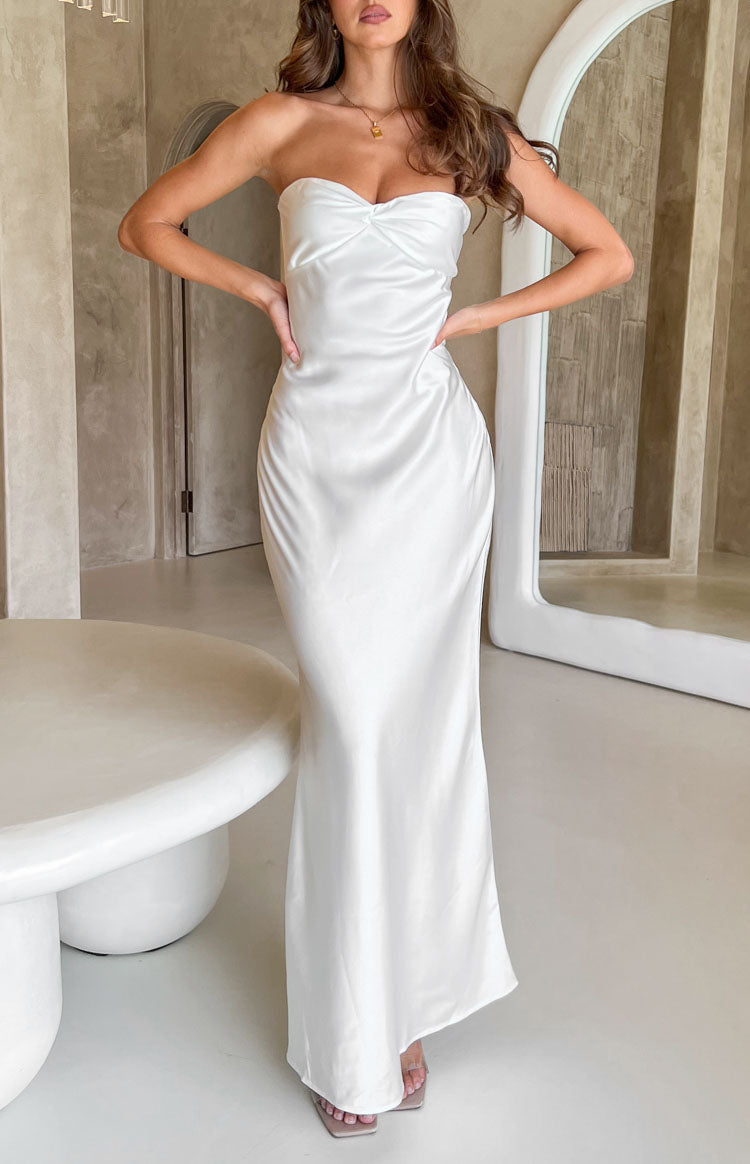 Front view of a white satin strapless maxi dress with a twisted sweetheart neckline
