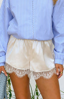Beginning Boutique Agnes Cream Satin Lace Shorts cream satin relaxed fit shorts with white lace trim