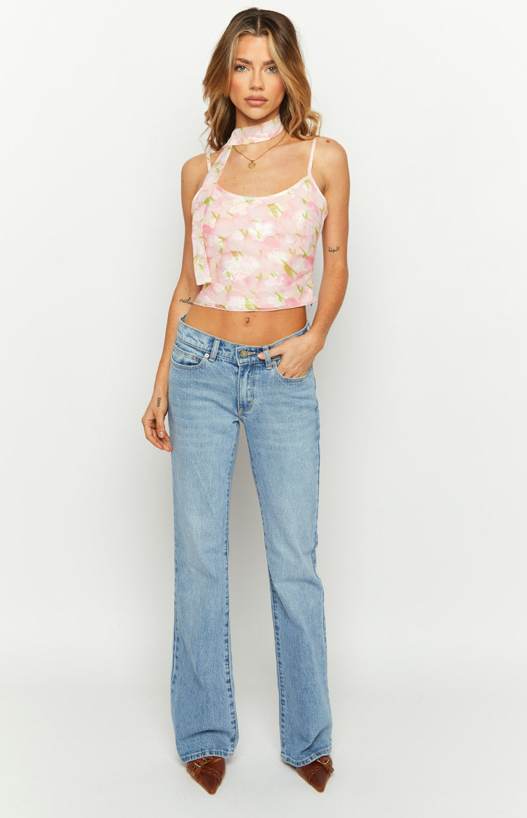 Close-up of the pink floral print cami top showing the textured fabric and neck tie detail
