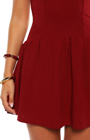 Model in the Alice Burgundy Halter Neck Mini Dress a sophisticated crepe dress with a V neck perfect for homecoming or a cocktail party.