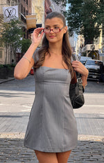 Front view of a grey pinstripe mini dress with a square neckline and short cap sleeves