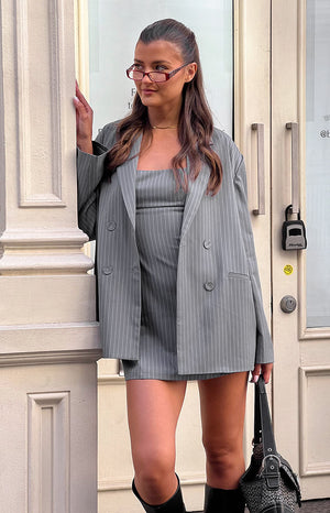 Fitted grey pinstripe mini dress with a square neckline
