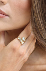 Close-up of the gold wrap ring with multiple heart-shaped diamantes
