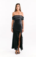 Model wears a black off-the-shoulder maxi dress with a side leg split for date night.
