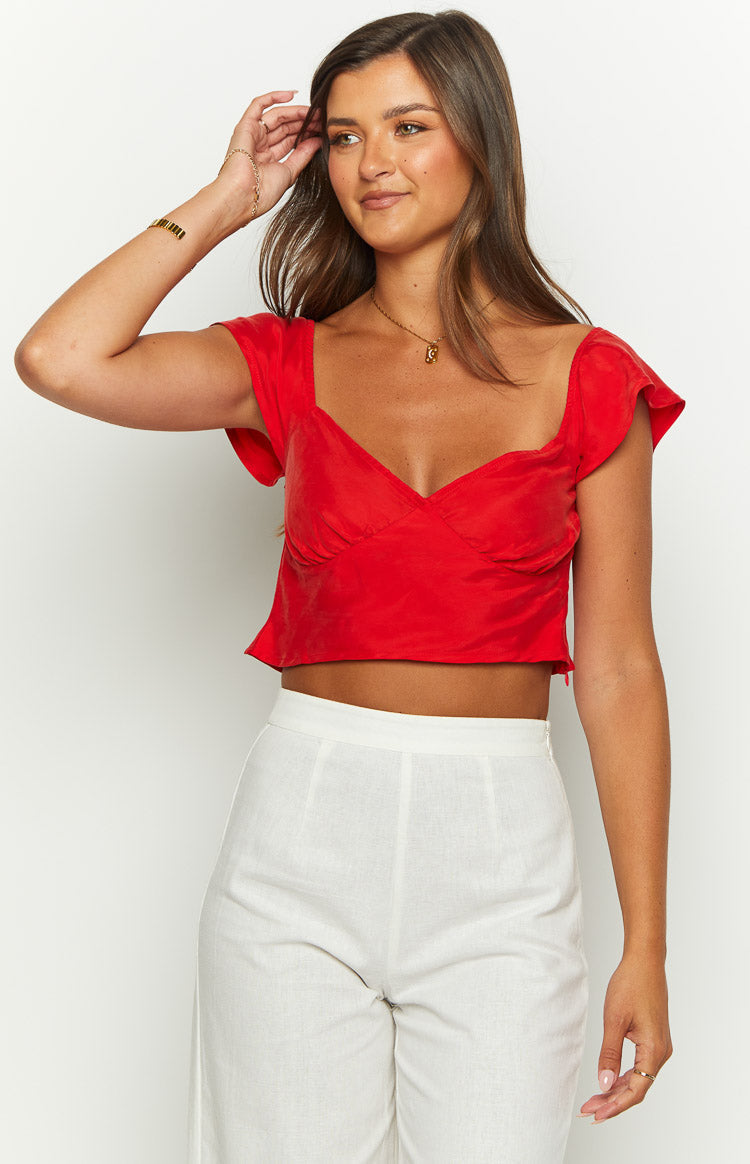 Beginning Boutique Anna Red Top red cropped top with sweetheart V-neckline, short flutter sleeves, and fitted bodice