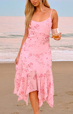 Pink sequin midi dress with spaghetti straps, V-neck, and a flowy handkerchief hem