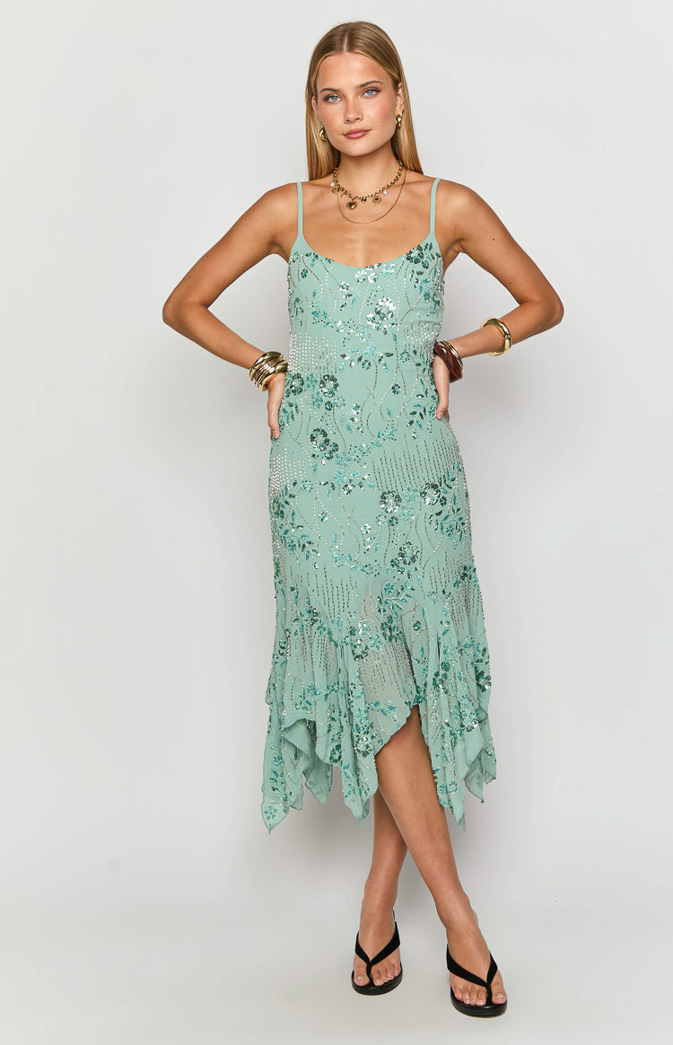 Teal midi dress with intricate floral sequin and bead embellishment and a handkerchief hem