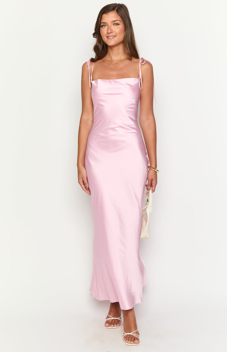 Front view of a pink satin maxi dress with a square neckline and delicate tie shoulder straps