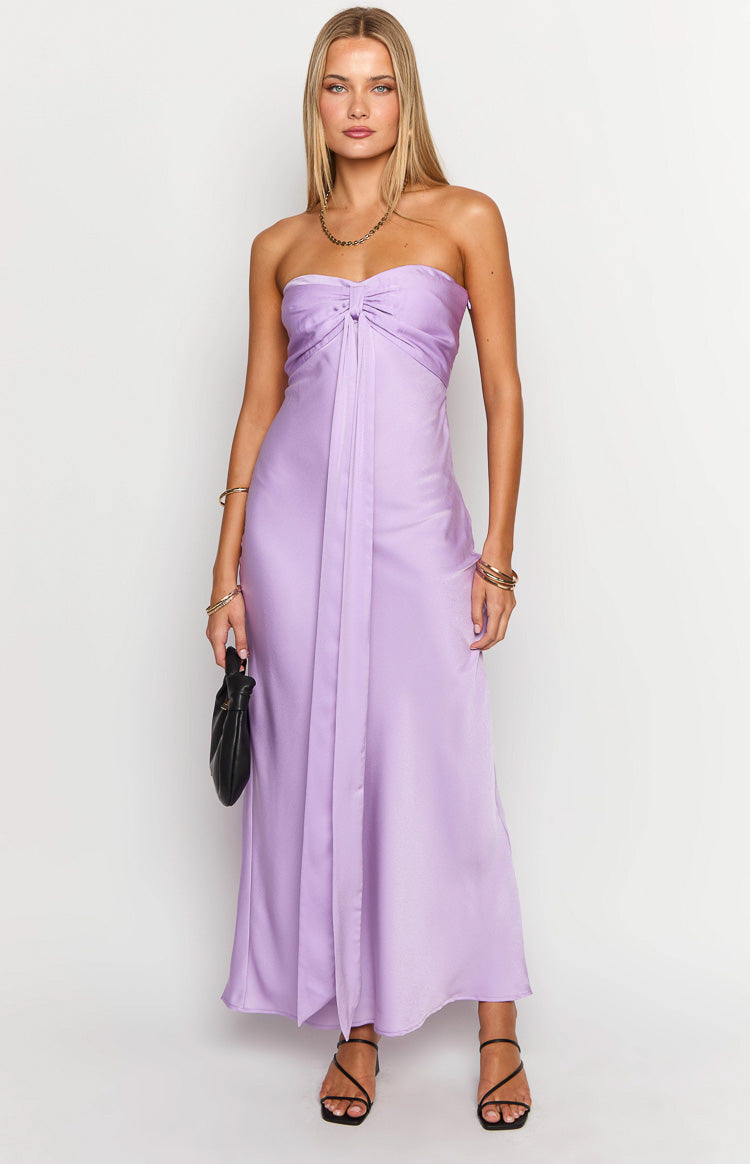 Front view of a lilac satin strapless maxi dress with a twisted knot detail at the bust and flowing skirt