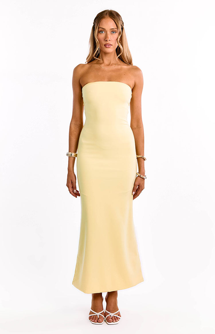 Yellow crepe maxi dress with a bandeau neckline, fitted through the body and flaring gently at the hem