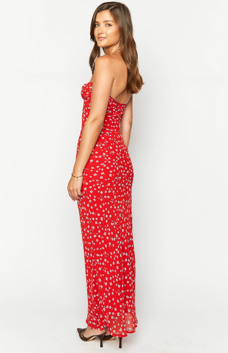Full length view of a red floral strapless maxi dress with a fitted silhouette and sweetheart neckline