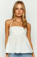 Beginning Boutique Axl White Halter Top white flowy halter top with open back, ring detail, and back ties