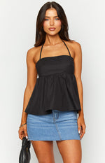 Front view of a black halter top with a gathered peplum waist and straight neckline
