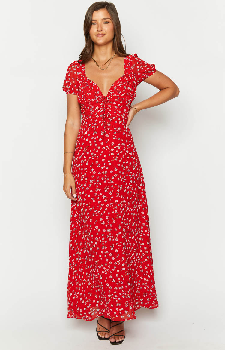 Red floral maxi dress with a sweetheart neckline, tie-front detail, and short puff sleeves