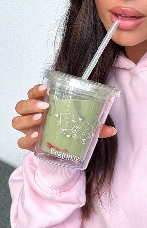Clear tumbler cup with BB logo print.