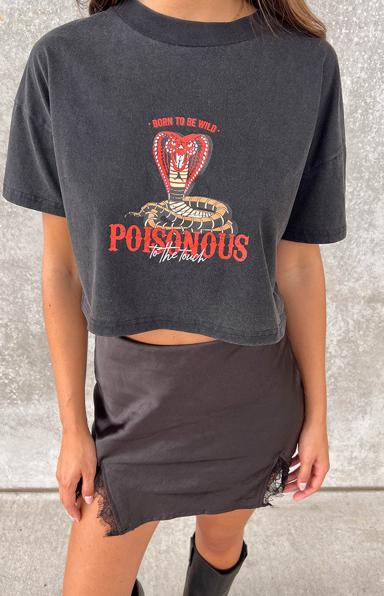 Washed black cropped tee with red cobra graphic and 'Poisonous to the Touch' slogan