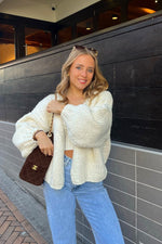 Cream chunky knit cardigan with oversized balloon sleeves and an open front