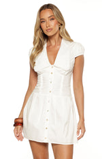 Front view of a white mini dress featuring a collared V-neck with lace trim and a button-front bodice