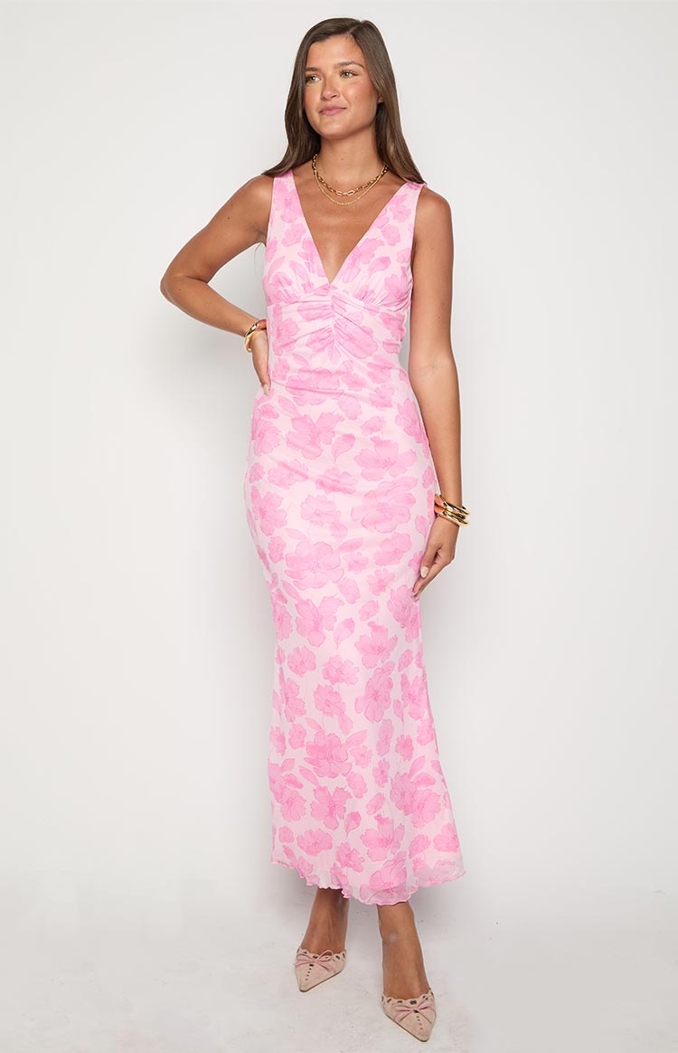 Pink floral maxi dress with a V-neckline and ruched detailing on the bust