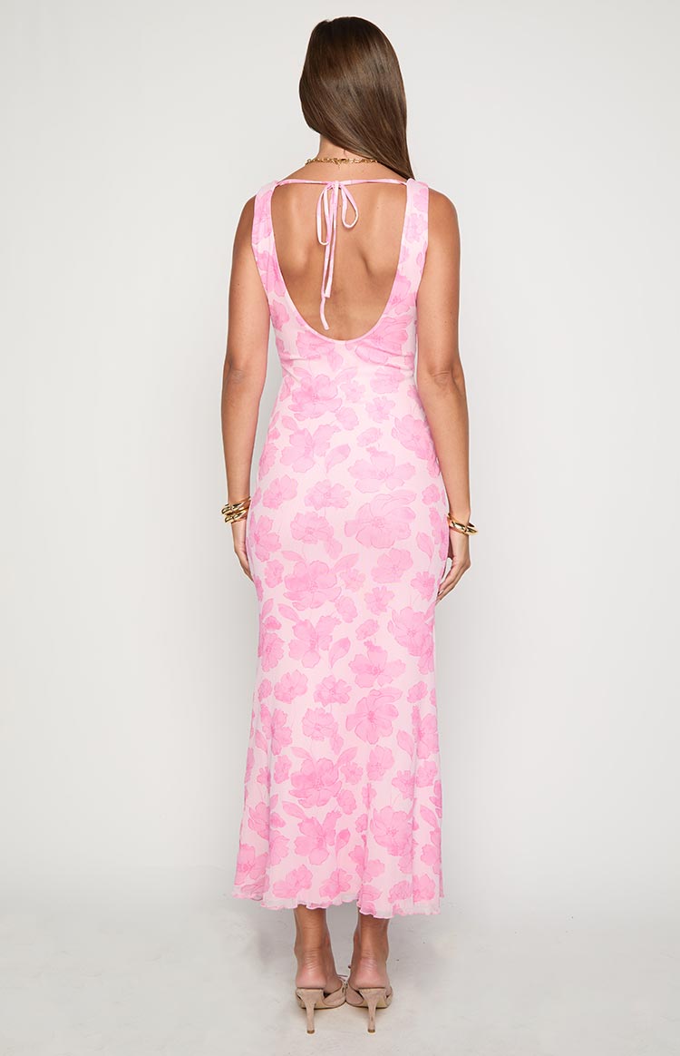 Rear view of a pink floral maxi dress with a low scoop back and self-tie straps