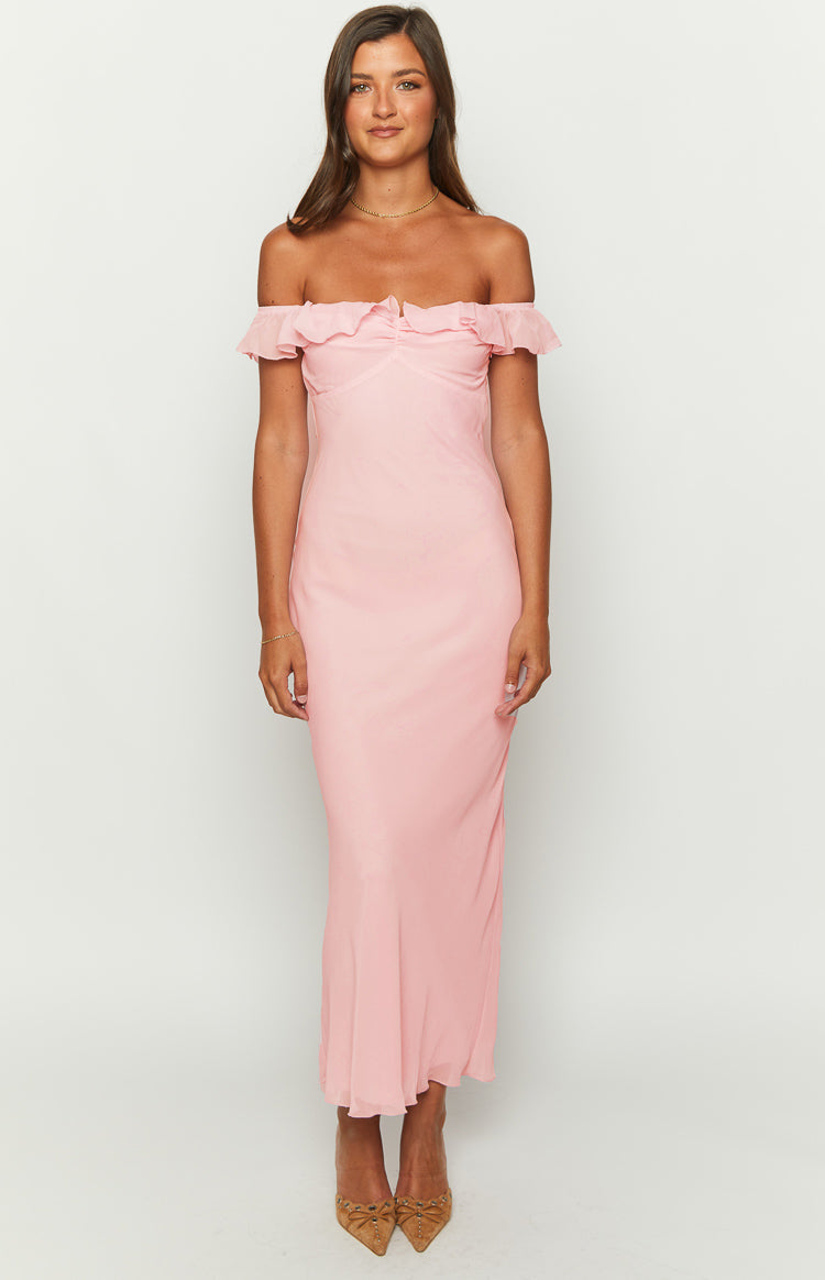 Front view of a pink chiffon maxi dress with an off-shoulder ruffled neckline and ruched bust