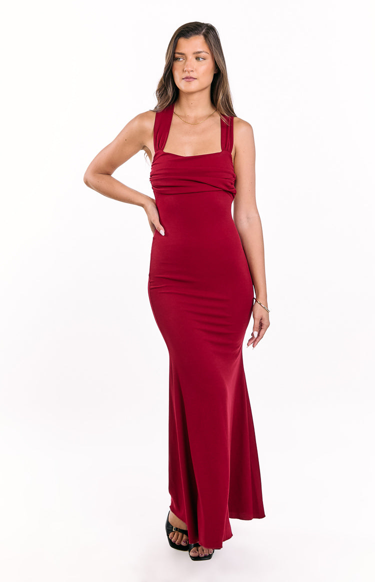 Front view of a wine maxi dress with a square neckline, ruched bodice, and wide shoulder straps