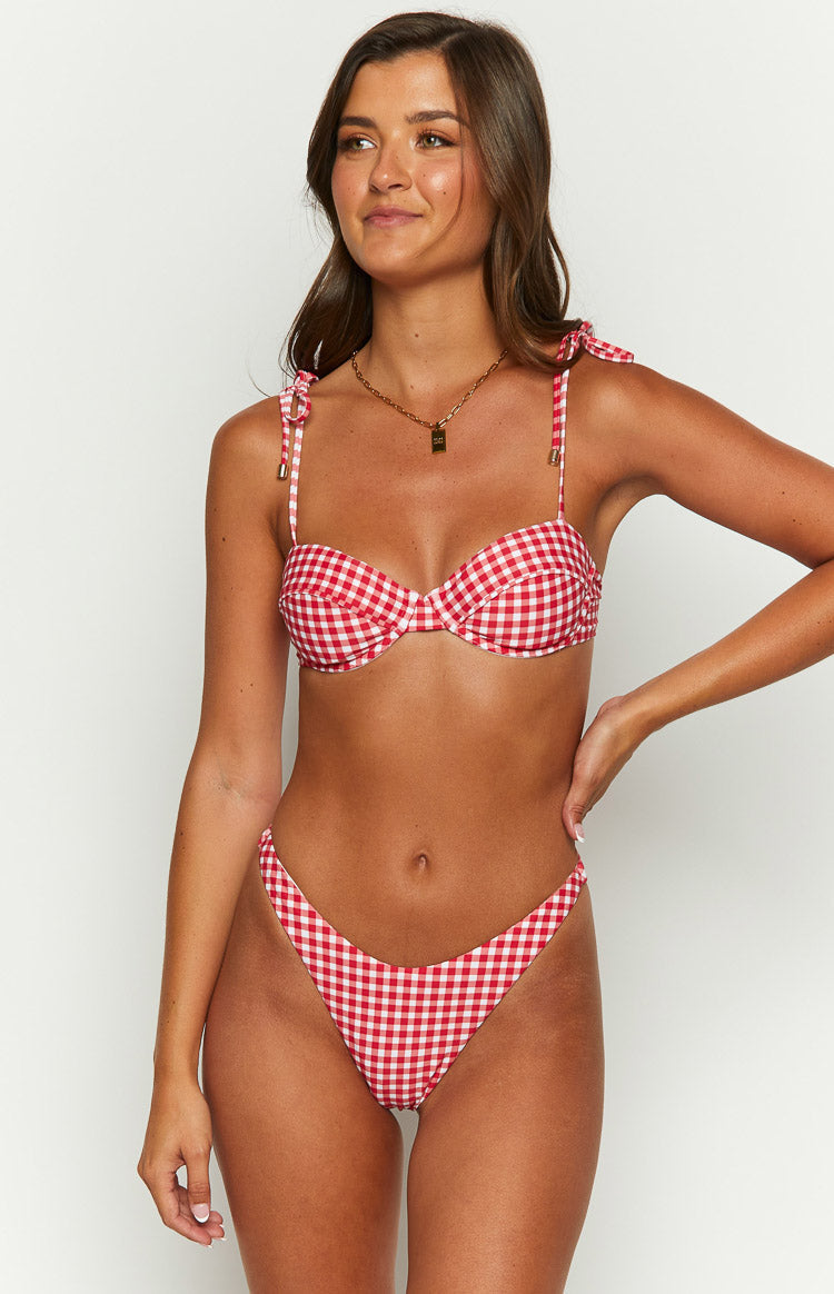 Front view of red and white gingham bikini bottoms with a high V-cut leg