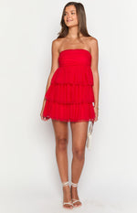 Red strapless mini dress with a ruched bandeau bodice and a tiered, ruffled tulle skirt