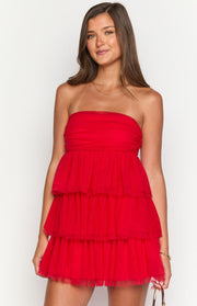 Red strapless mini dress with a ruched bodice and three-tiered ruffled skirt