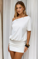 Beginning Boutique Bisou White Off Shoulder Mini Dress white off-shoulder mini dress with a relaxed blouson top and fitted sk