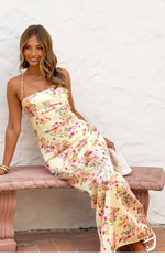 Yellow bloom floral satin maxi dress with a ruched bodice and flowing skirt