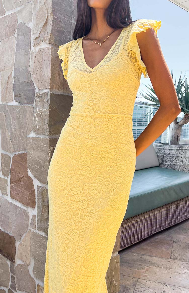 Beginning Boutique Blake Yellow Lace Maxi Dress yellow floral lace V-neck maxi dress with ruffled cap sleeves and fitted silhouette