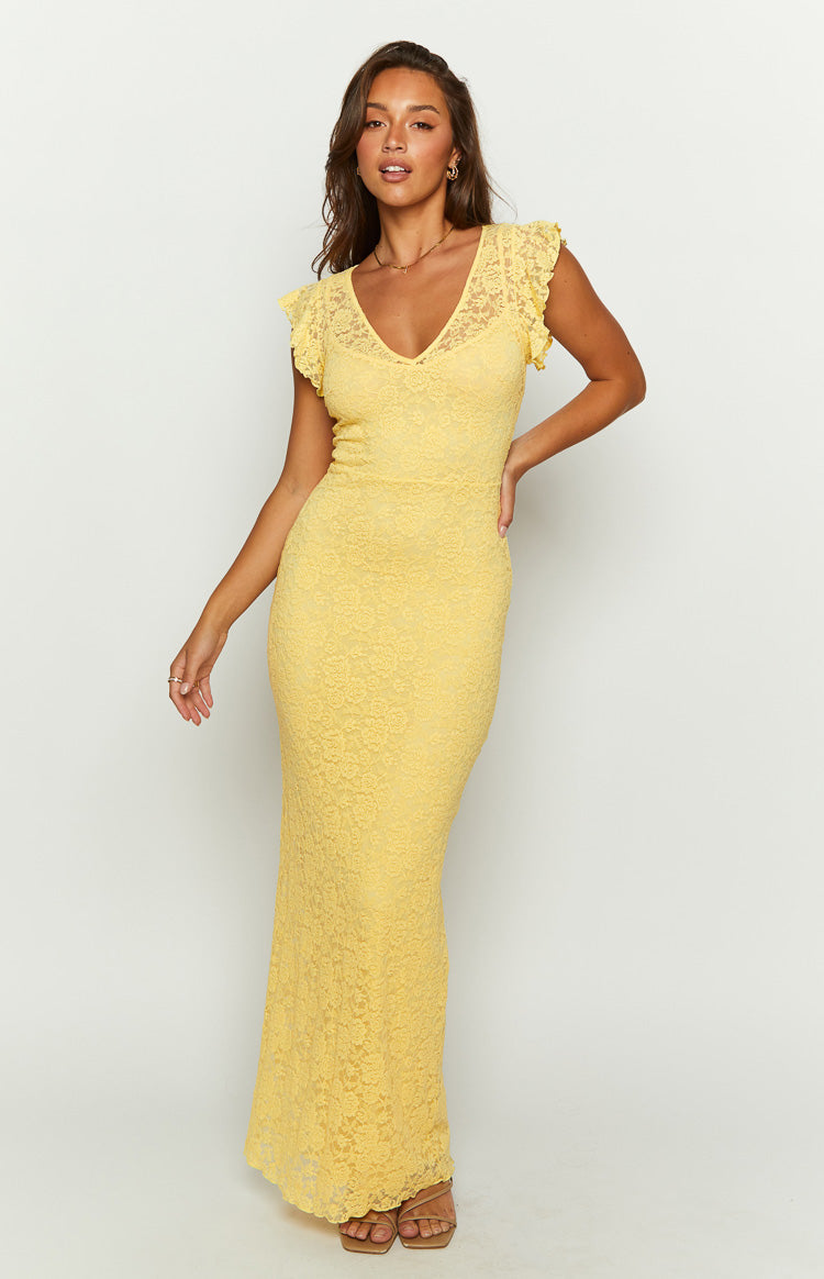Yellow lace maxi dress with a V-neckline, short flutter sleeves, and a fitted silhouette