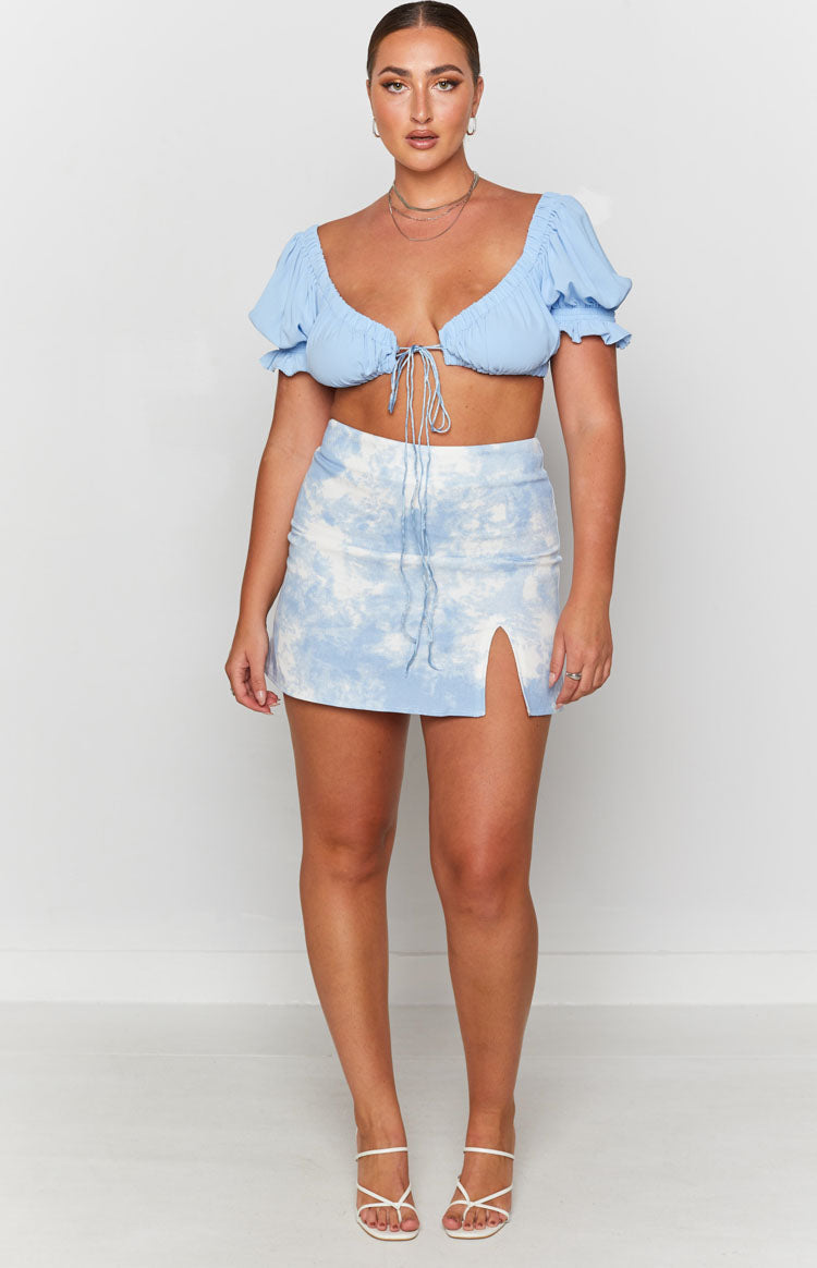 Light blue and white tie-dye denim mini skirt with a high waist and front thigh split