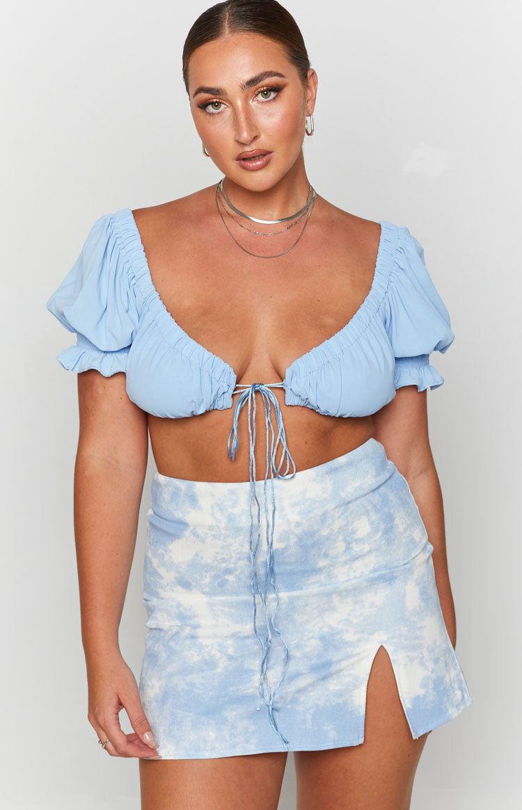 Light blue and white tie-dye denim mini skirt with a high waist and left side split