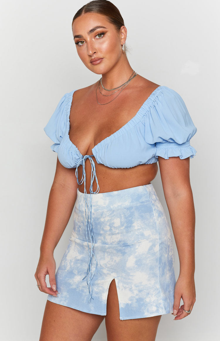 Light blue and white tie-dye denim mini skirt with a high waist and front split
