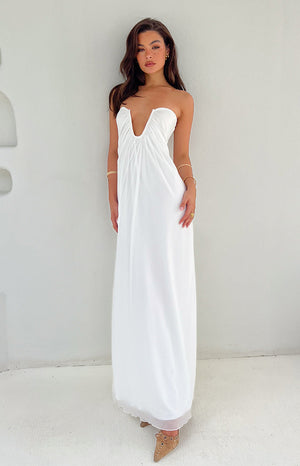 Beginning Boutique Braelyn White Strapless Maxi Dress white strapless deep V-neck ruched bodice flowy maxi dress with sheer hem
