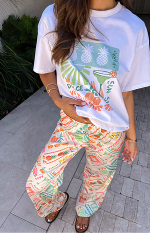Beginning Boutique Bridget Dolce Vita Print Pants cream wide-leg pants with colourful Dolce Vita print and elasticated waist