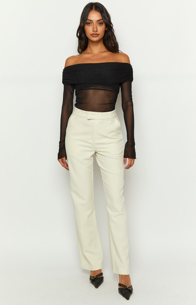 Cream high-waisted straight leg tailored pants with belt loops and a smooth front