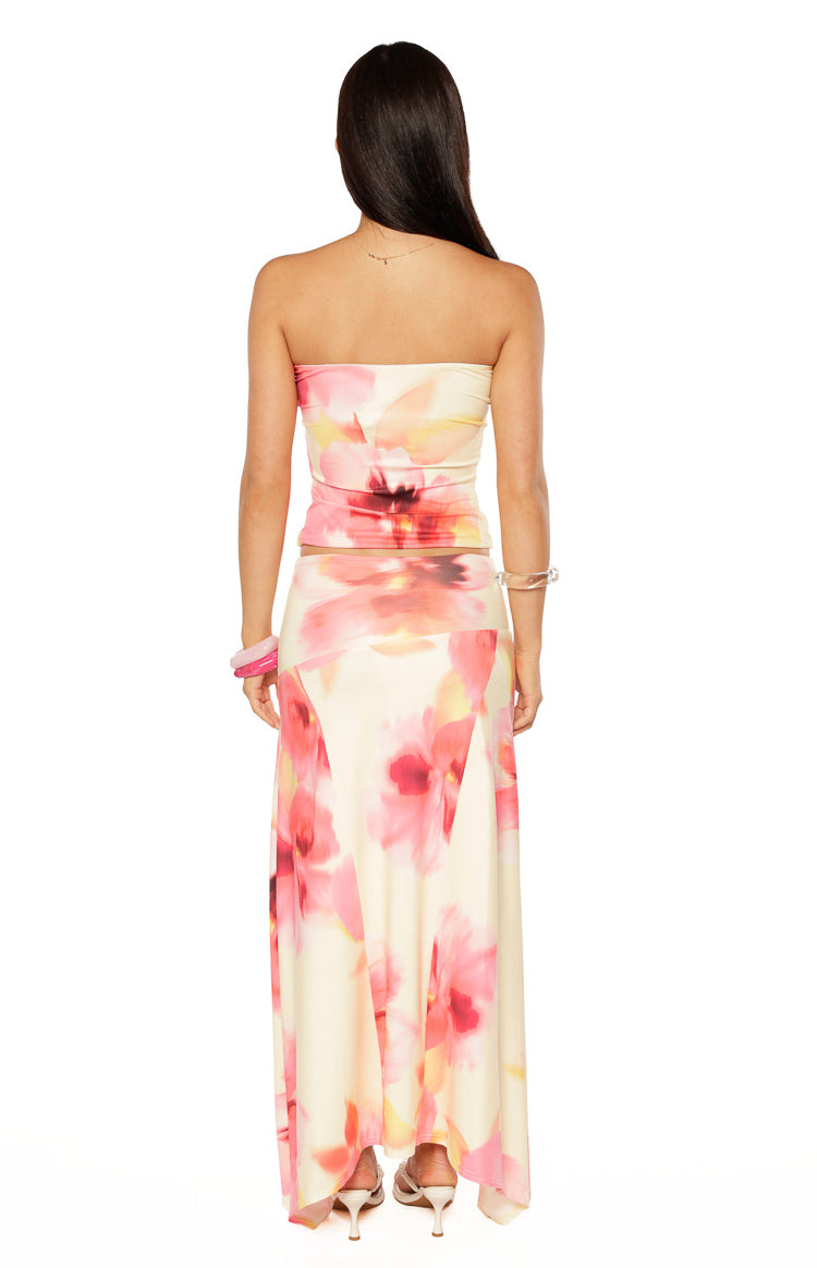 Rear view of the fitted yellow and pink floral print strapless tube top