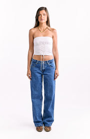 Mid-wash blue low-waist baggy leg jeans with a relaxed fit and classic five-pocket design