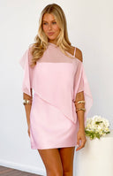 Asymmetrical neckline of a pink satin mini dress with a draped chiffon overlay and one thin shoulder strap