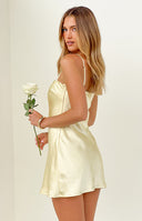 Beginning Boutique Chelsea Yellow Satin Mini Dress pale yellow satin square neck mini dress with thin spaghetti straps