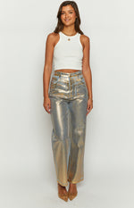 Front view of high-waisted gold and silver metallic straight-leg jeans with a distressed texture